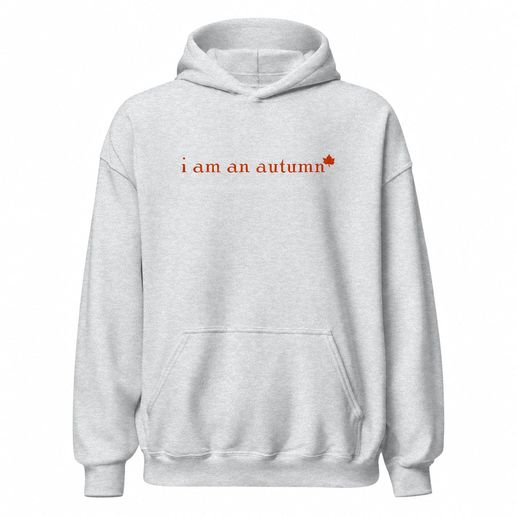 Gray hoodie with 'i am an autumn' text and maple leaf on a white background